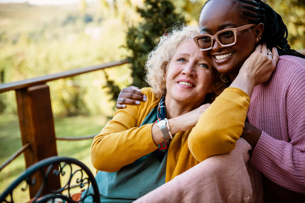 A senior woman undergoing rehabilitation, with the full-time care of a younger female at home.